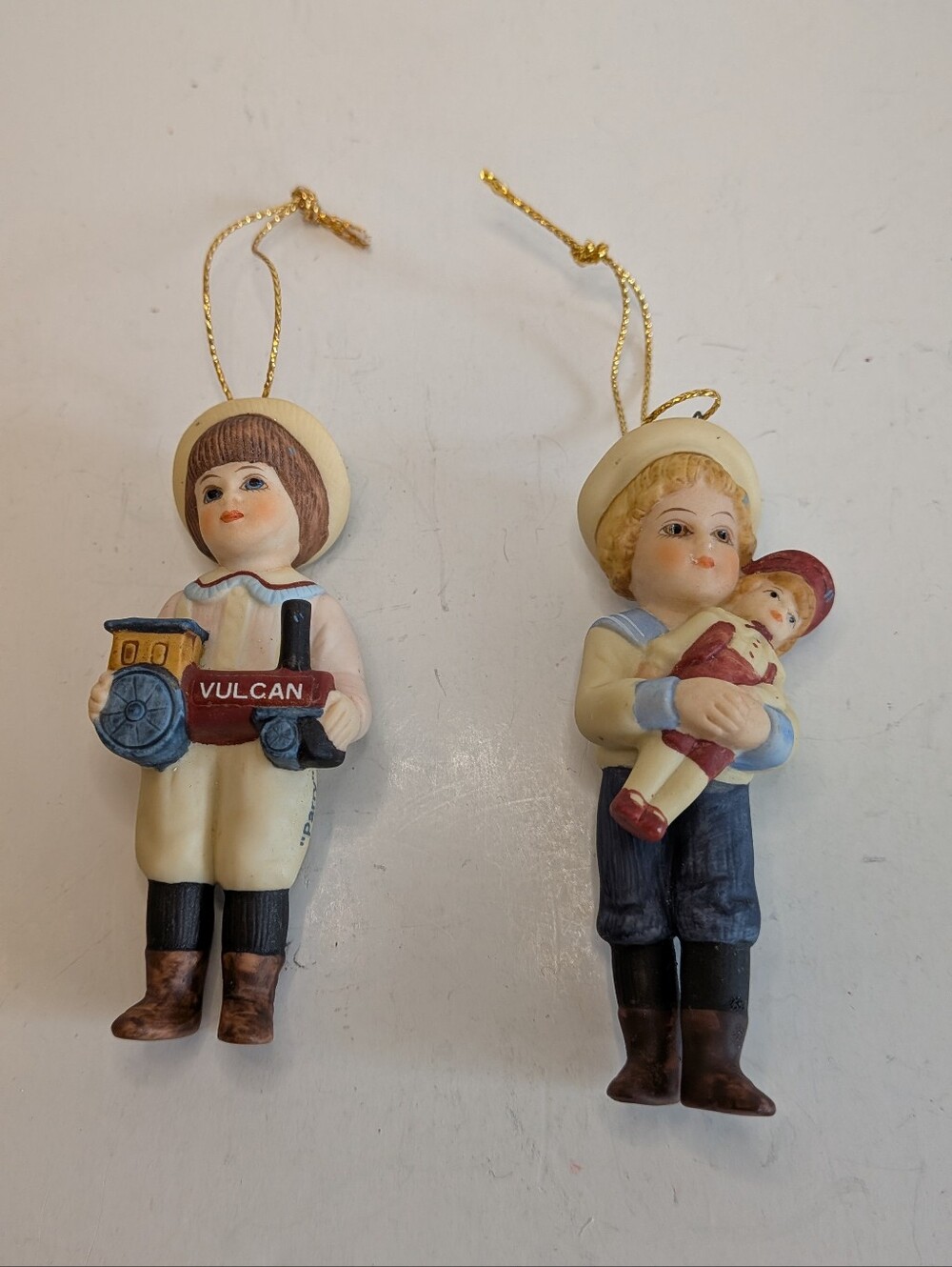 Vintage Children Ornaments Boy with Vulcan Toy Train Holding Doll Tree Decor